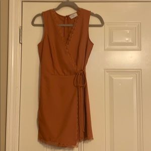 Rust romper with lace trim